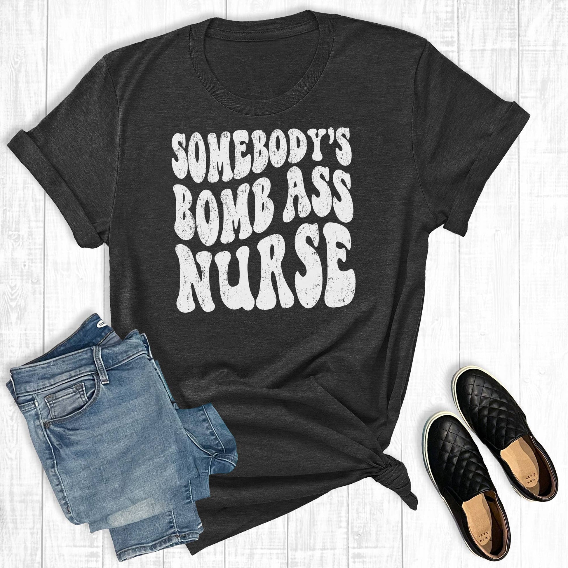 Somebody's Bomb Ass Nurse Graphic Tee